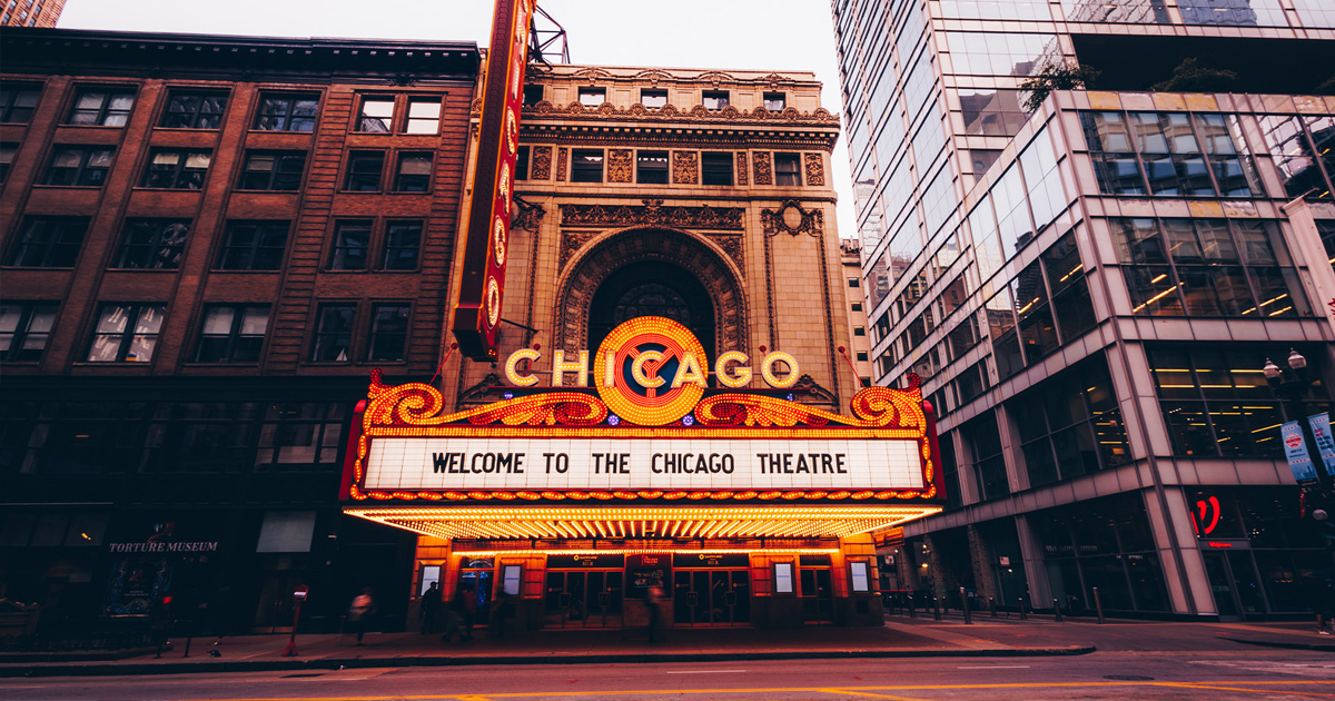 The Chicago Theatre marquee lit up over State Street
