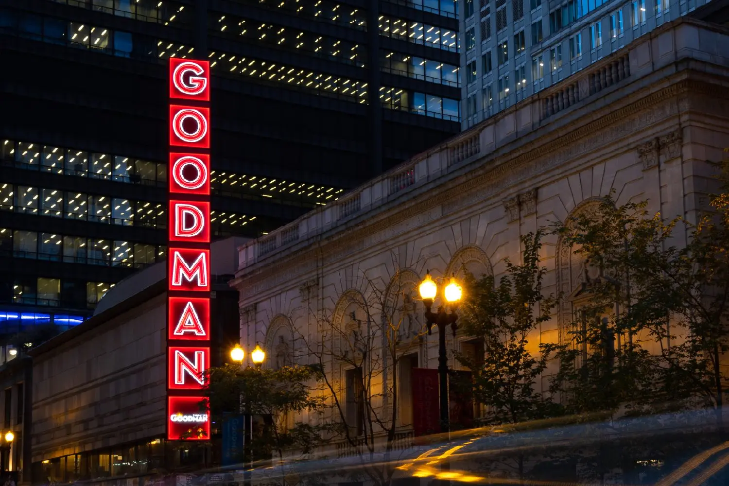 The Goodman Theatre's red vertical marquee sign at night